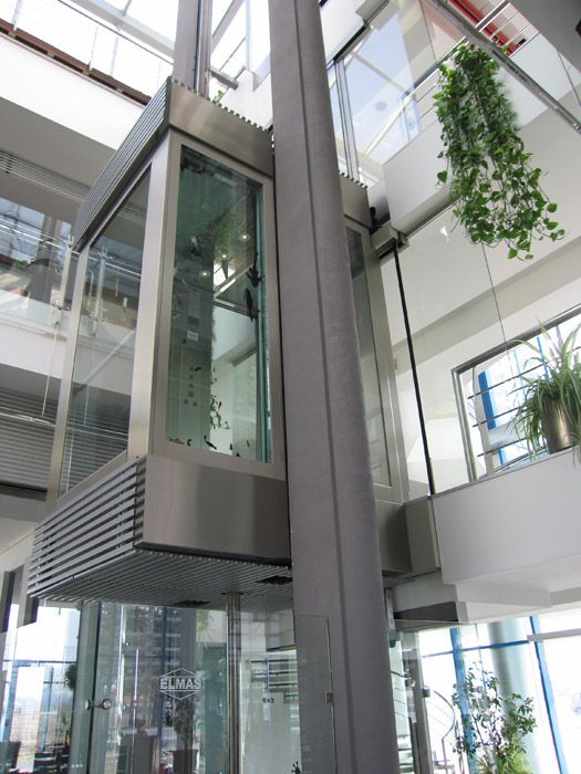 Vidraçaria Big Vidros - Imagem contendo elevador utilizando o vidro como fechamento